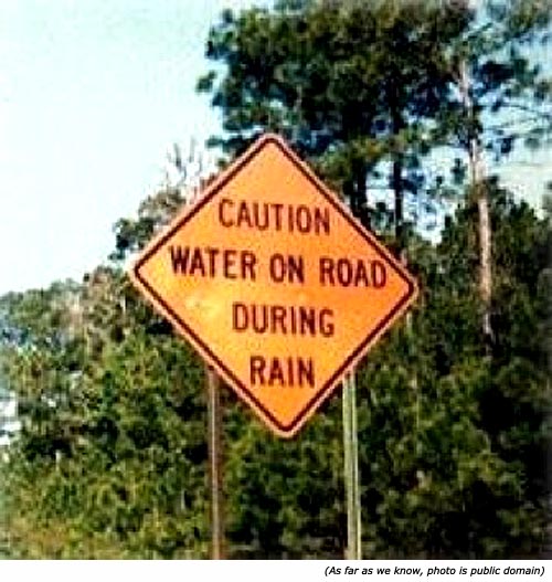 funny-traffic-signs-caution-water-on-road-during-rain.jpg